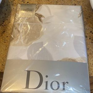NWT. Dior cotton queen flat sheet.